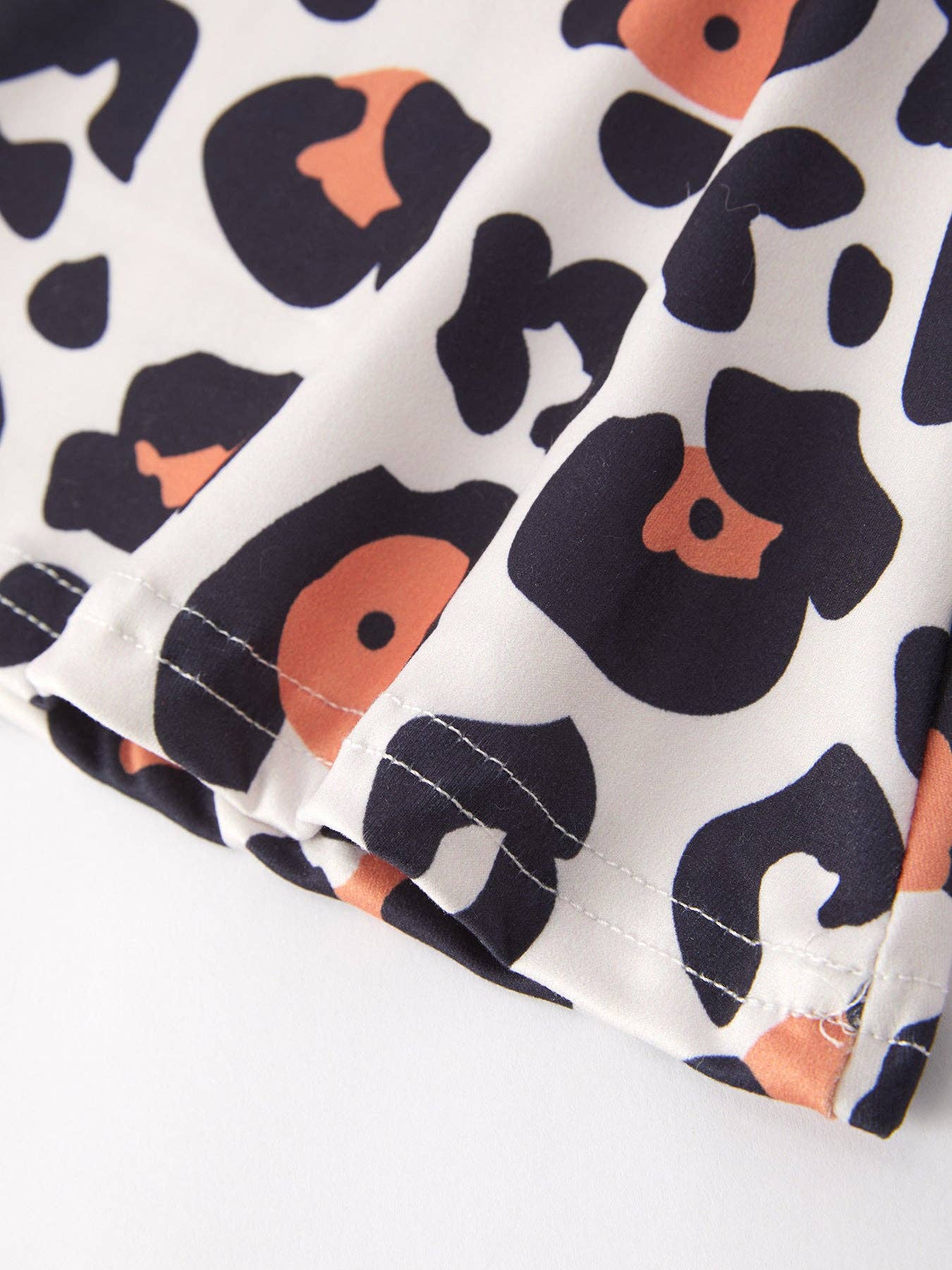 "HE IS RISEN" Applique Leopard Set