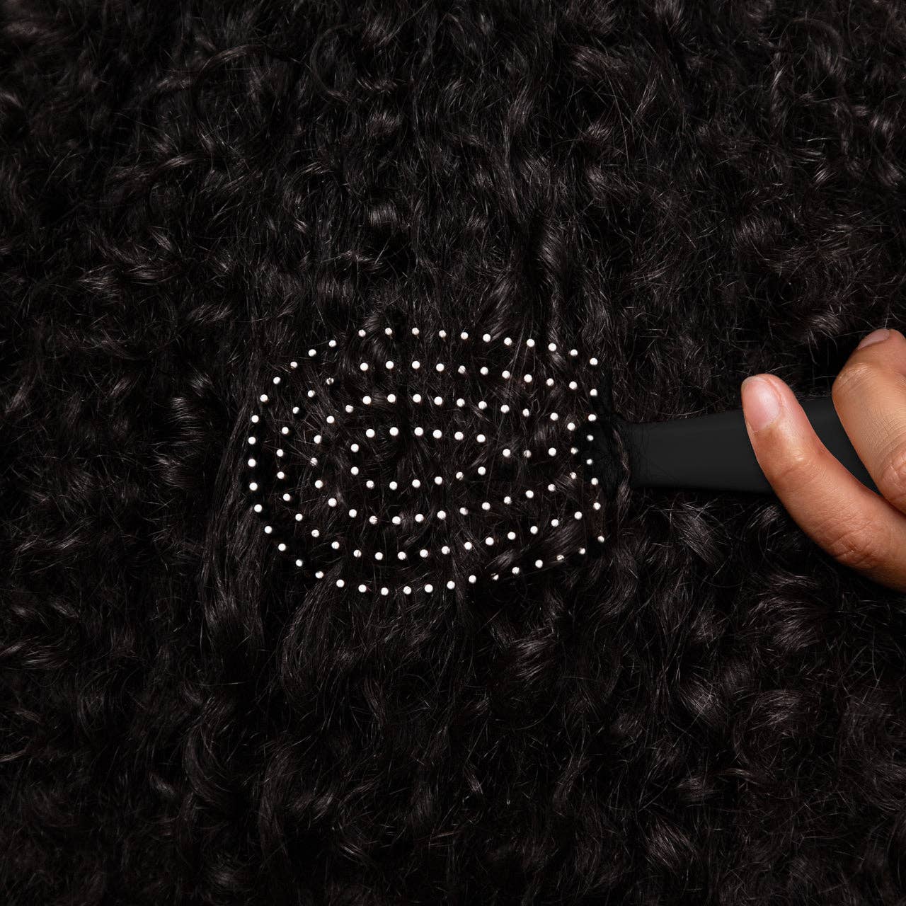 Mini Black Detangling Flexi Brush